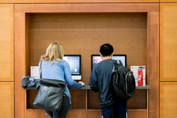 students filling out Online forms on computers