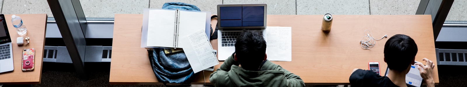 Graduate students studying in education building