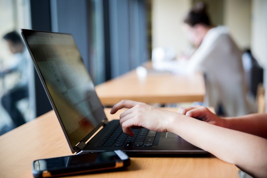 student working on a laptop